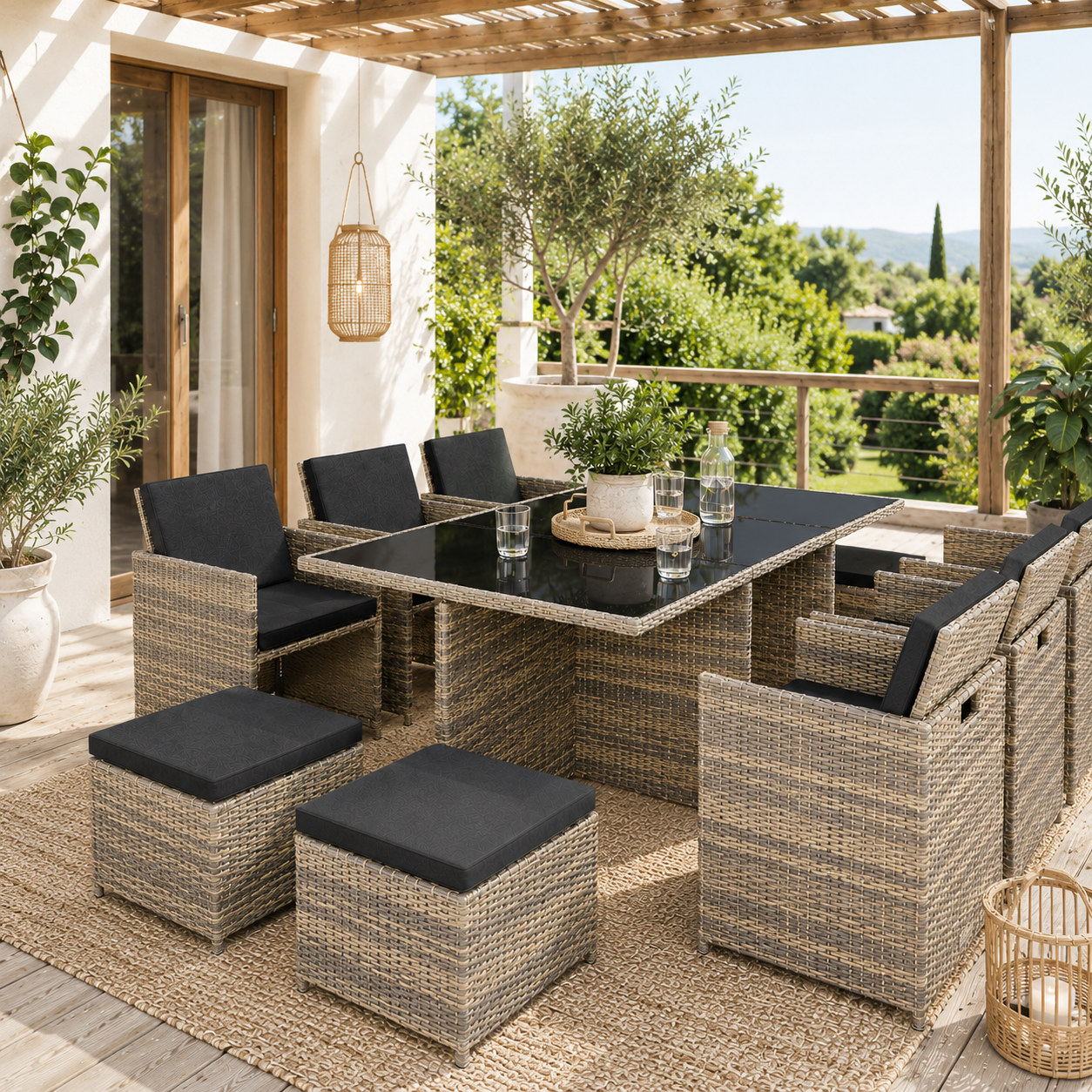 Rattan seating set with table and stools on a covered terrace